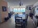 Bright dining room with water views and large table at 6020 Shore S Blvd # 301, Gulfport, FL 33707