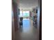 View from entryway into dining room, featuring a table and water view at 6020 Shore S Blvd # 301, Gulfport, FL 33707