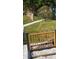 Landscaped walkway with trees and gate at 6020 Shore S Blvd # 301, Gulfport, FL 33707