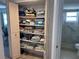 Well-organized linen closet with ample storage at 6020 Shore S Blvd # 301, Gulfport, FL 33707