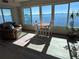 Living room with water views and seating area at 6020 Shore S Blvd # 301, Gulfport, FL 33707