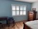 Main bedroom with water views and built-in dresser at 6020 Shore S Blvd # 301, Gulfport, FL 33707