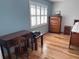 Main bedroom with hardwood floors and a desk at 6020 Shore S Blvd # 301, Gulfport, FL 33707