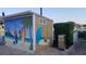 Well-maintained pool equipment shed with fun art at 6020 Shore S Blvd # 301, Gulfport, FL 33707