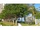 Scenic walkway leading to waterfront with lush trees and benches at 6020 Shore S Blvd # 301, Gulfport, FL 33707