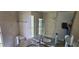 Bathroom with granite countertop, double vanity, shower and toilet at 6906 Quail Hollow Blvd, Wesley Chapel, FL 33544