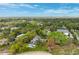 Aerial view showcasing home's waterfront location and lush surroundings at 750 71St S Ter, St Petersburg, FL 33705