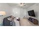 Living room with gray sofa and fireplace at 8239 Crescent Oaks Dr, New Port Richey, FL 34655