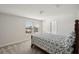 Bedroom with a double bed and carpeted floors at 8614 Mercator Ct, Parrish, FL 34219