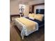 Main bedroom with walk-in closet and built-in shelving at 9950 47Th N Ave # 104, St Petersburg, FL 33708