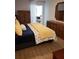 Spacious bedroom with large bed and access to patio at 9950 47Th N Ave # 104, St Petersburg, FL 33708