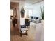 Inviting entryway with view of living room and hardwood floors at 9950 47Th N Ave # 104, St Petersburg, FL 33708