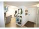 Entryway with cabinet and view into kitchen at 9950 47Th N Ave # 104, St Petersburg, FL 33708