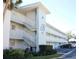 Two-story building with parking and landscaping at 9950 47Th N Ave # 104, St Petersburg, FL 33708