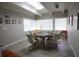 Game room with large table and chairs, perfect for game night at 9950 47Th N Ave # 104, St Petersburg, FL 33708