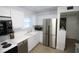Well-equipped kitchen with stainless steel appliances at 9950 47Th N Ave # 104, St Petersburg, FL 33708