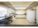 Well-equipped community kitchen with ample counter space at 9950 47Th N Ave # 104, St Petersburg, FL 33708