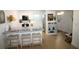 Bright, updated kitchen with white cabinets and breakfast bar at 9950 47Th N Ave # 104, St Petersburg, FL 33708