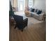 Relaxing living room with comfortable seating and flooring at 9950 47Th N Ave # 104, St Petersburg, FL 33708