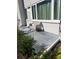 Small patio with seating area outside back door at 9950 47Th N Ave # 104, St Petersburg, FL 33708