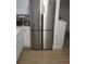 Sleek stainless steel Haier French door refrigerator at 9950 47Th N Ave # 104, St Petersburg, FL 33708