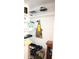 Storage closet with shelving, shoe racks, and space for coats and bags at 9950 47Th N Ave # 104, St Petersburg, FL 33708