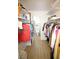 Large walk-in closet with shelves and rods for hanging clothes at 9950 47Th N Ave # 104, St Petersburg, FL 33708