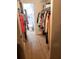 Spacious walk-in closet with ample shelving and hanging space at 9950 47Th N Ave # 104, St Petersburg, FL 33708