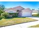 Charming one-story home with two-car garage at 1016 Standing Reed Pl, Wesley Chapel, FL 33543