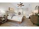 Bright bedroom with large bed and ensuite bathroom access at 11927 Middlebury Dr, Tampa, FL 33626