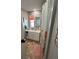 Bathroom featuring a floral shower curtain and updated vanity at 13225 101St St # 425, Largo, FL 33773
