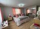 Bright bedroom with king-size bed and mirrored closet at 13225 101St St # 425, Largo, FL 33773