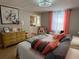 Spacious bedroom with king-size bed and stylish decor at 13225 101St St # 425, Largo, FL 33773