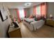 King-size bed and light-colored decor at 13225 101St St # 425, Largo, FL 33773
