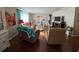 Relaxing living room with ample seating, a coffee table, and a built-in fireplace at 13225 101St St # 425, Largo, FL 33773
