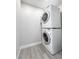 Stackable LG washer and dryer in a laundry closet at 14028 Hurricane Dr, Weeki Wachee, FL 34614