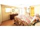 Cozy bedroom with a queen-size bed and private access to the bathroom at 18675 Us Highway 19 N # 232, Clearwater, FL 33764