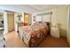 Comfortable bedroom with a queen-size bed and plenty of natural light at 18675 Us Highway 19 N # 232, Clearwater, FL 33764