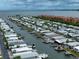 Aerial view of waterfront community with many mobile homes at 18675 Us Highway 19 N # 232, Clearwater, FL 33764