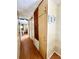 Long hallway with linen closet and access to bedrooms at 18675 Us Highway 19 N # 232, Clearwater, FL 33764