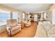 Open living room with two recliners and a view of the kitchen at 18675 Us Highway 19 N # 232, Clearwater, FL 33764
