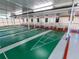 Indoor shuffleboard courts with seating for residents at 18675 Us Highway 19 N # 232, Clearwater, FL 33764