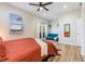 Spacious bedroom with king bed, sitting area, and balcony access at 1910 W Union St, Tampa, FL 33607