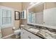 Clean bathroom with granite countertop and white cabinets at 2048 Edelweiss Loop, Trinity, FL 34655