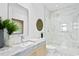 Modern bathroom with marble vanity and a large walk-in shower at 3020 W Santiago St # 5, Tampa, FL 33629