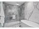 Luxurious bathroom featuring a soaking tub and a large shower at 3020 W Santiago St # 5, Tampa, FL 33629