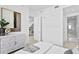 Spacious bedroom with a view into the bathroom and walk-in closet at 3020 W Santiago St # 5, Tampa, FL 33629