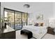 Spacious bedroom with a large bed and city views at 3020 W Santiago St # 5, Tampa, FL 33629