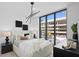 Bright bedroom with large windows and a comfortable bed at 3020 W Santiago St # 5, Tampa, FL 33629