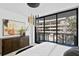 Bright bedroom with large windows and city views at 3020 W Santiago St # 5, Tampa, FL 33629